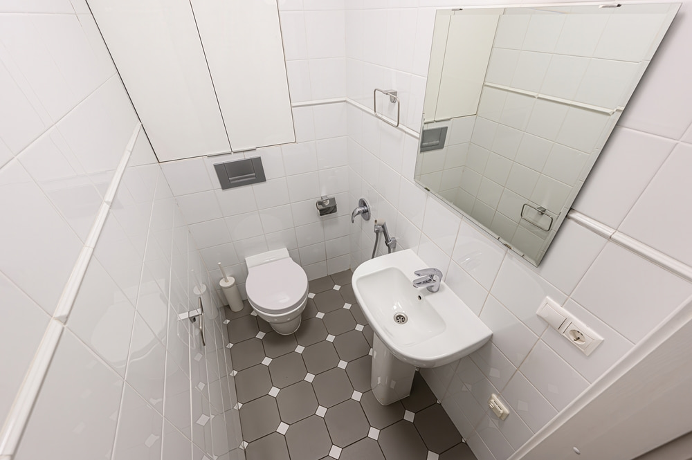 What flooring makes a small bathroom look bigger?